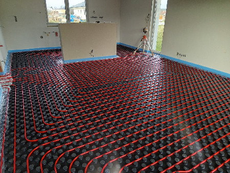 Montáž teplovodního podlahového topení